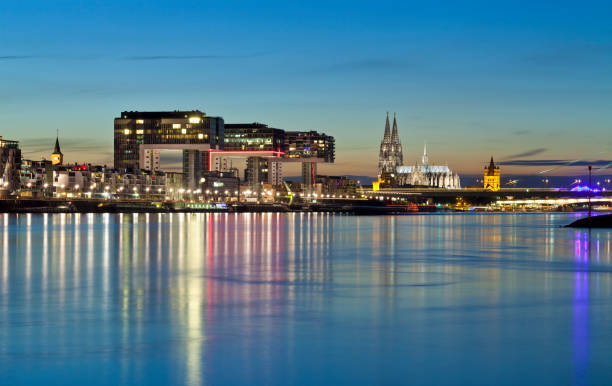 istock Cologne Cathedral and Rheinau Harbor (Rheinauhafen) at night 874024998