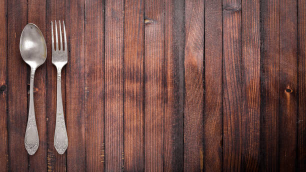 istock Old cutlery. On Wooden background. Top view. 874029694