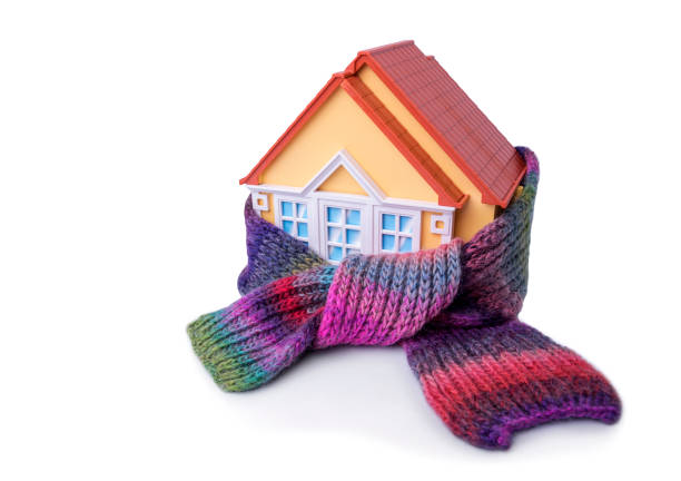istock House is wrapped in a scarf. 874029936