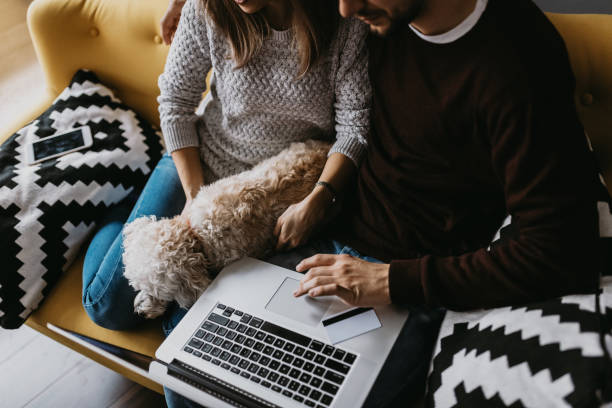 istock Top view of couple paying bills online 874030340