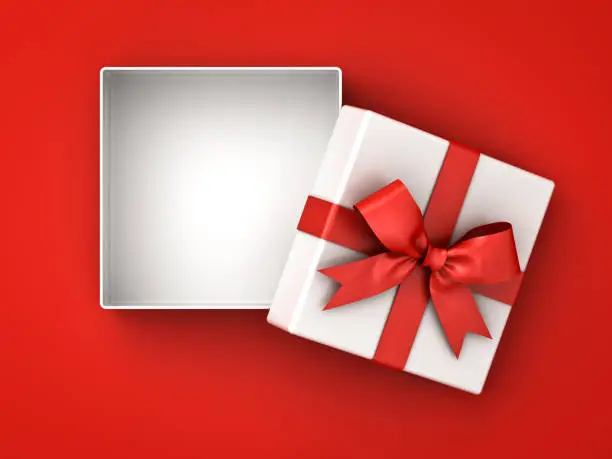 Photo of Open gift box , present box with red ribbon bow and blank space in the box isolated on red background with shadow