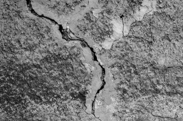 istock texture of gray decorative plaster with a large crack on the whole frame 874030900
