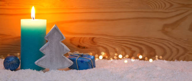 istock Christmas blue decoration and Advent candle. Christmas card 874036478