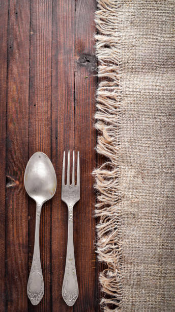 istock Old cutlery. On Wooden background. Top view. 874036672
