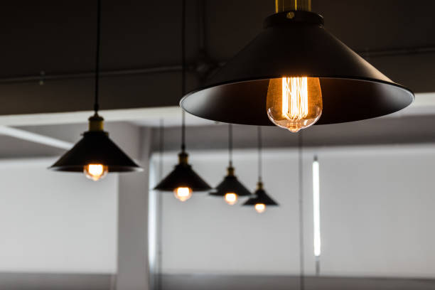 istock A group of hanging lights with shallow depth of field 874036774