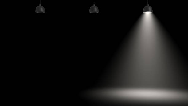 istock 3d rendering of three pendant lamps with only one glowing in the darkness. 874036854