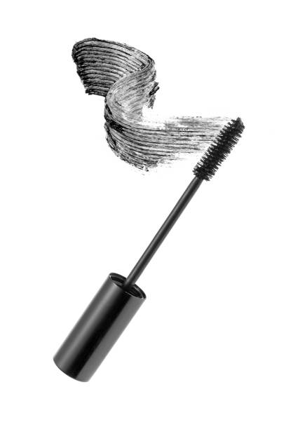 istock Black mascara brush stroke with applicator brush 874047902
