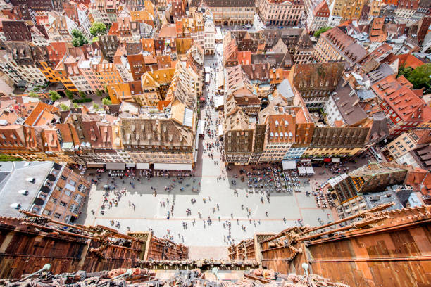 Strasbourg city in France Top cityscape view on the cathedral square crowded with people in the old town of Strasbourg city, France strasbourg stock pictures, royalty-free photos & images