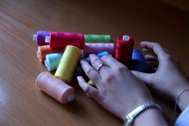 istock Colorful threads ready for use by artists and hobbyists. 874051344