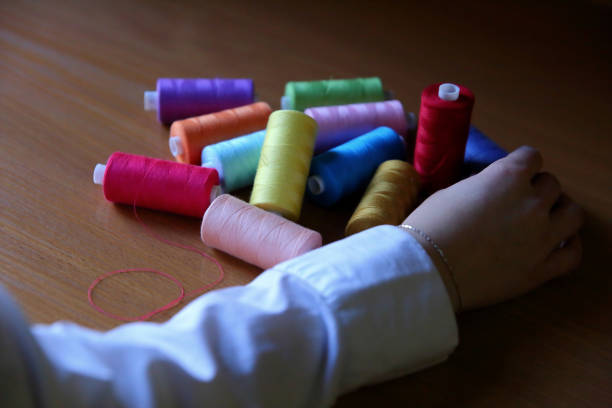 istock Colorful threads ready for use by artists and hobbyists. 874051698