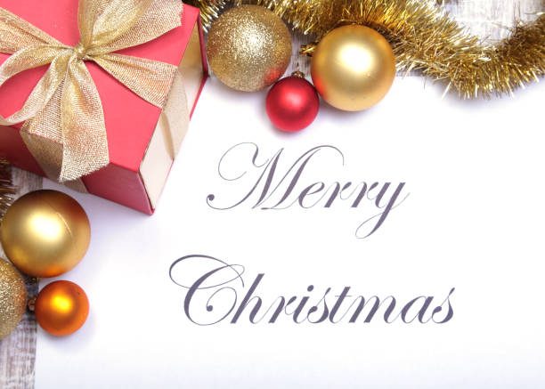 istock Text merry christmas on paper with gift box and many balls 874058508