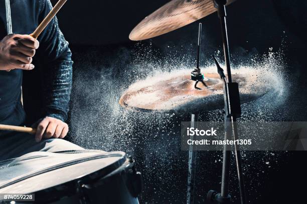 Drummer Rehearsing On Drums Before Rock Concert Man Recording Music On Drum Set In Studio Stock Photo - Download Image Now