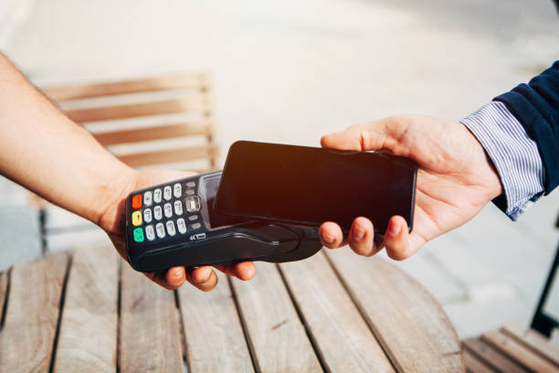 istock Contactless payment with smart phone 874063454