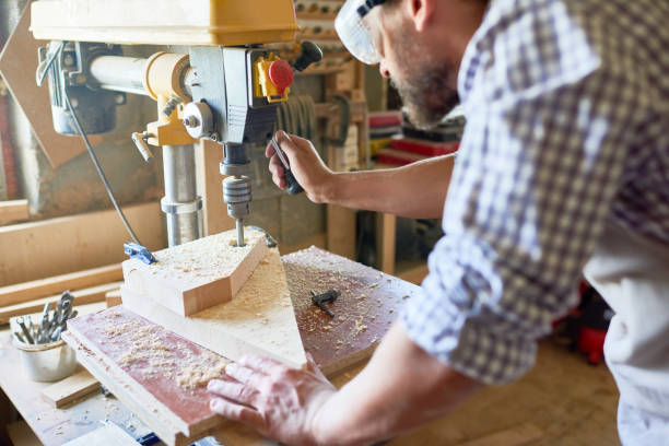 istock Mature Carpenter Working in Joinery 874066952