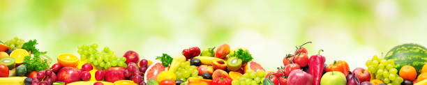 istock Panoramic collection fresh fruits and vegetables for skinali 874070400