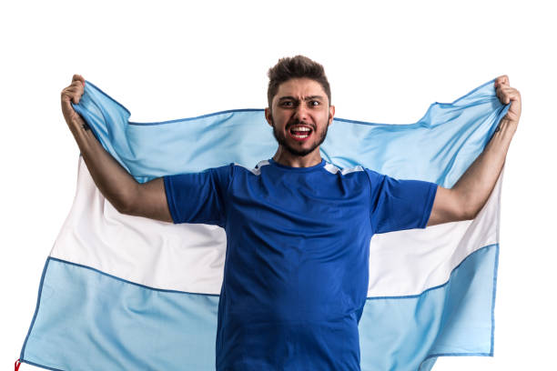 istock Argentinian athlete / fan celebrating on white background 874070882