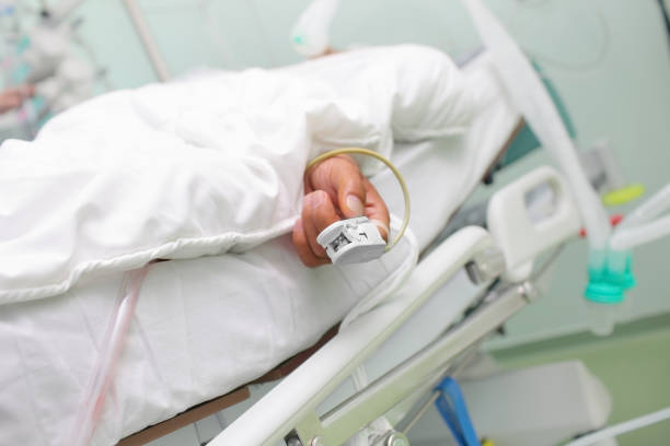 istock Oxygen saturation measurement device on the patients finger 874071952