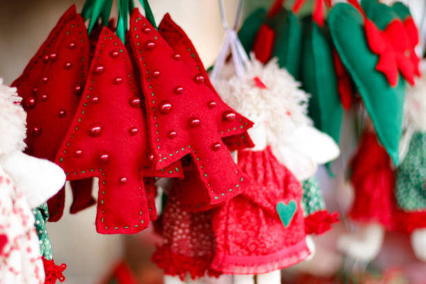 Detail of craftsmanship with Santa and Christmas arrangements for home