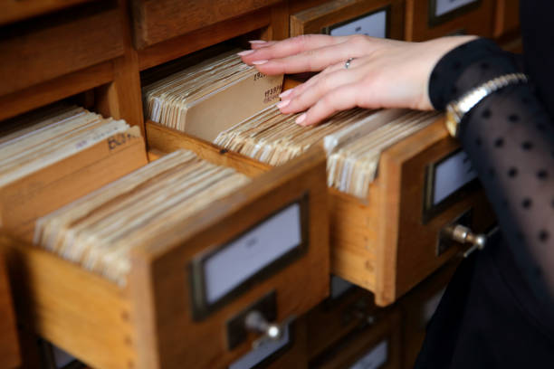 istock Each book in the library is placed in a catalog so that it can be easily found. 874078328