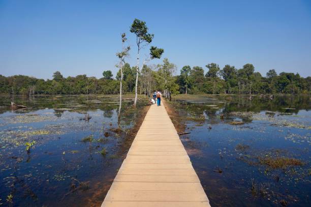 istock Blue reflections on the water, Neak Pean, Cambodia 874078876