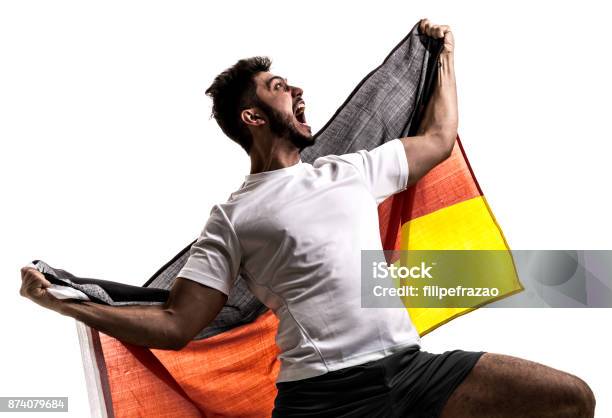 German Athlete Fan Celebrating On White Background Stock Photo - Download Image Now