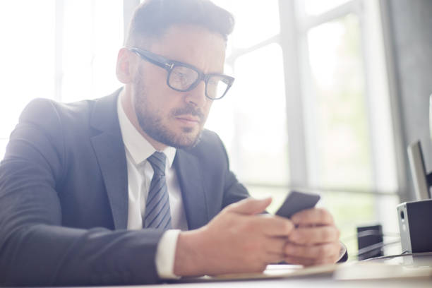 istock Bearded Businessman at Workplace 874088266