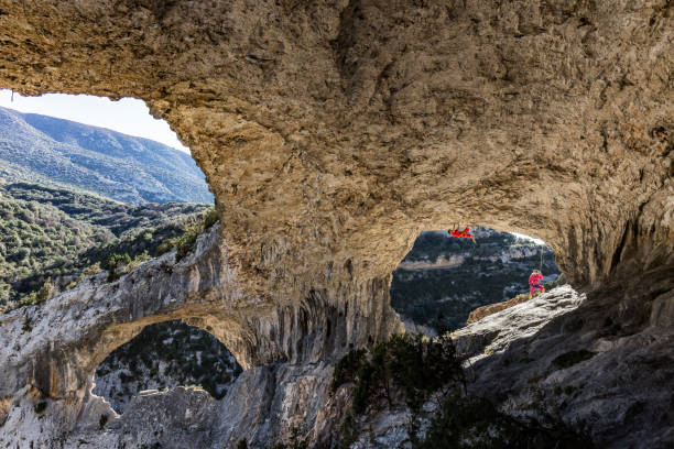 istock Rock climbers in El Delfin Rodellar Aragon Spain 874092748