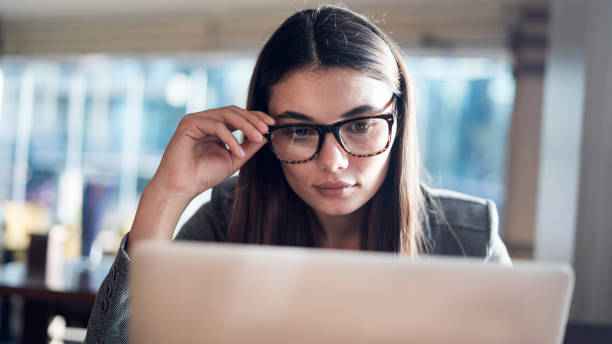 istock Businesswoman working in computer in office 874106400