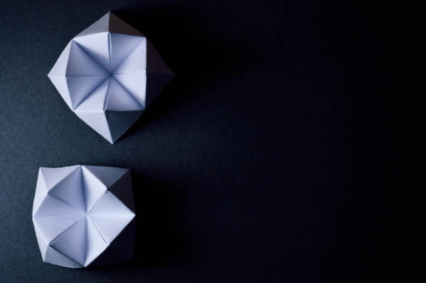istock origami fortune tellers on dark background 874106812