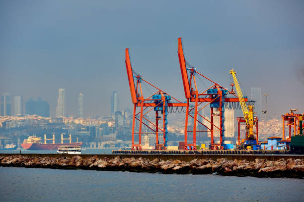 istock Logistics and transportation of Container Cargo ship and Cargo plane with working crane bridge in shipyard, logistic import export and transport industry background 874110970