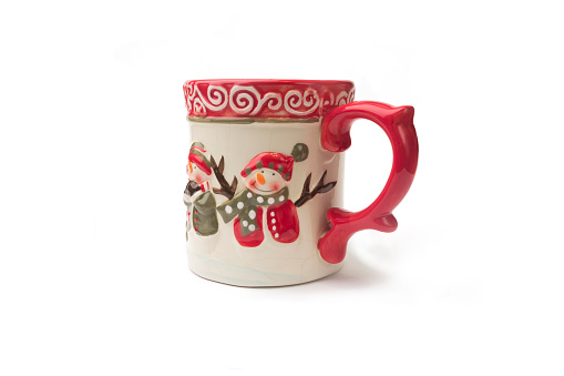 Festive Christmas mug featuring jolly and happy snowmen on pure white background