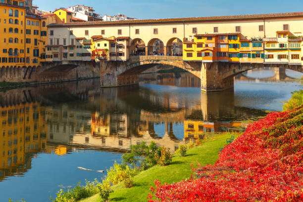 istock River Arno and Ponte Vecchio in Florence, Italy 874117714