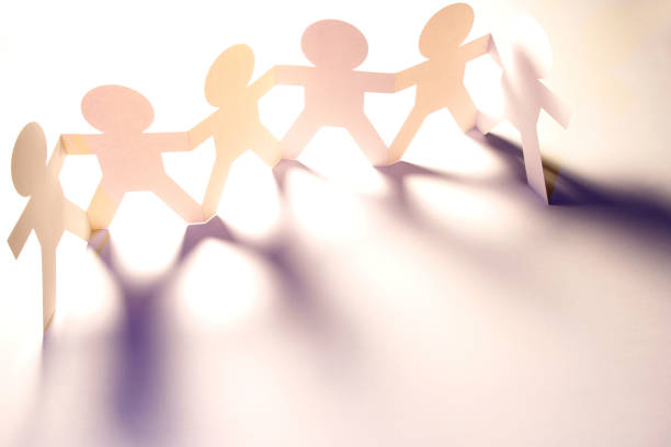 istock Paper chain team united 874121210