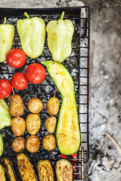 istock Assorted grilled vegetables.Chef cooking vegetables.top view close up 874132662