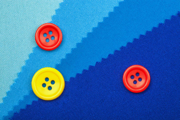 istock blue button and samples of fabric texture detail 874133092
