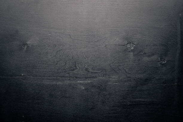 istock Wooden black surface. Top view. Free space. 874138808