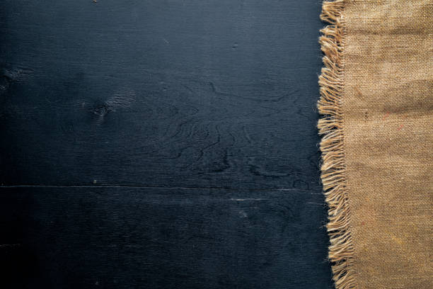 istock Lining fabric. On a wooden background. Top review. Free space. 874139244
