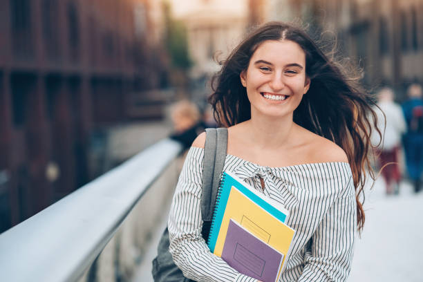 istock Happy student on the way to the university 874160438