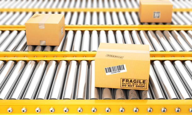 istock Cardboard boxes on a conveyor line. 3d illustration 874163754
