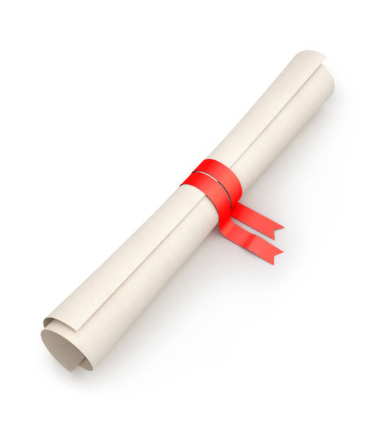 istock Graduation diploma scrolling bound with red ribbon, isolated on white 874165078