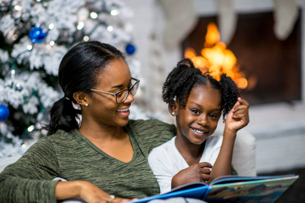 istock Mother And Daughter Reading 874176190