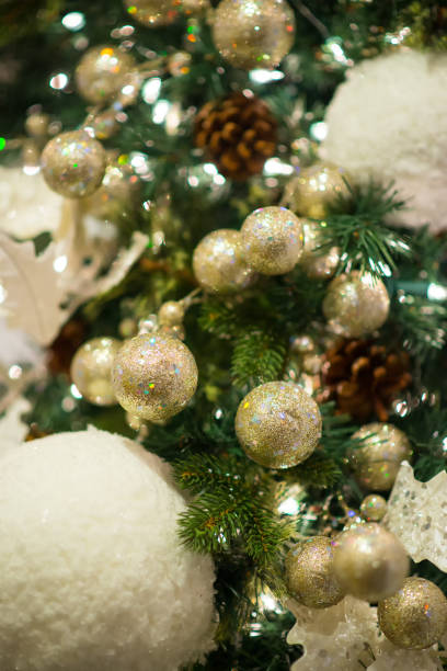 istock Chirstmas ornaments hanging burry background 874176402
