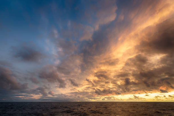 HDR Sunset over sea horizon