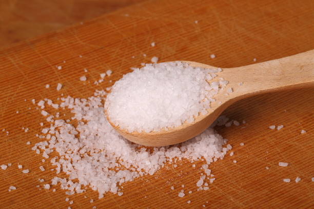 istock Ocean salt in a wooden spoon 874189622
