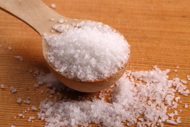 istock Ocean salt in a wooden spoon 874189694