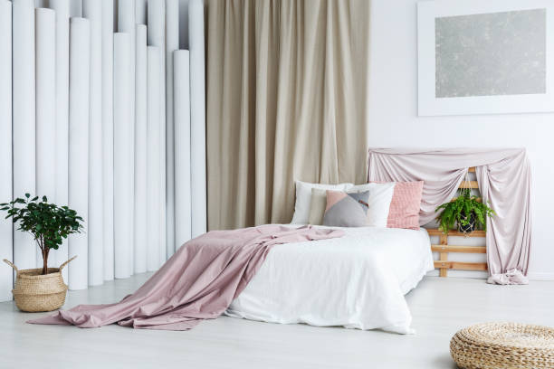 istock Creative bedroom with tube decoration 874190750