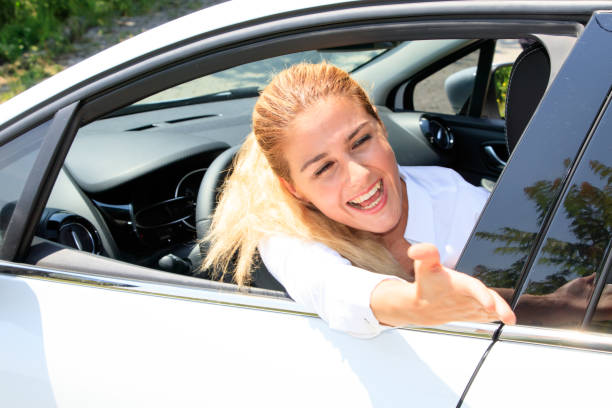 istock Woman is driving her car 874193614