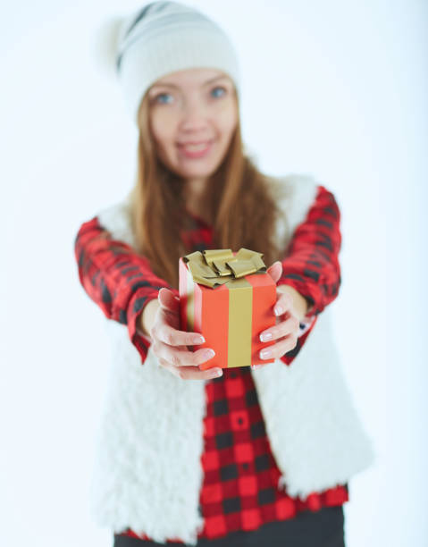 istock Portrait happy woman with gift box in hands. 874193858