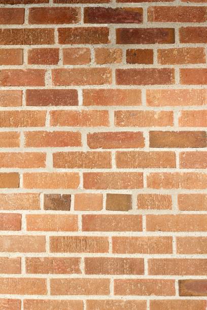 istock Attractive pinkish brown traditional brick wall background 874196626