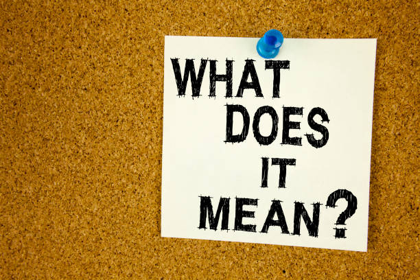 istock Conceptual hand writing text caption inspiration showing question What Does It Mean. Business concept for question and unknown written on sticky note, reminder cork background with copy space 874197596